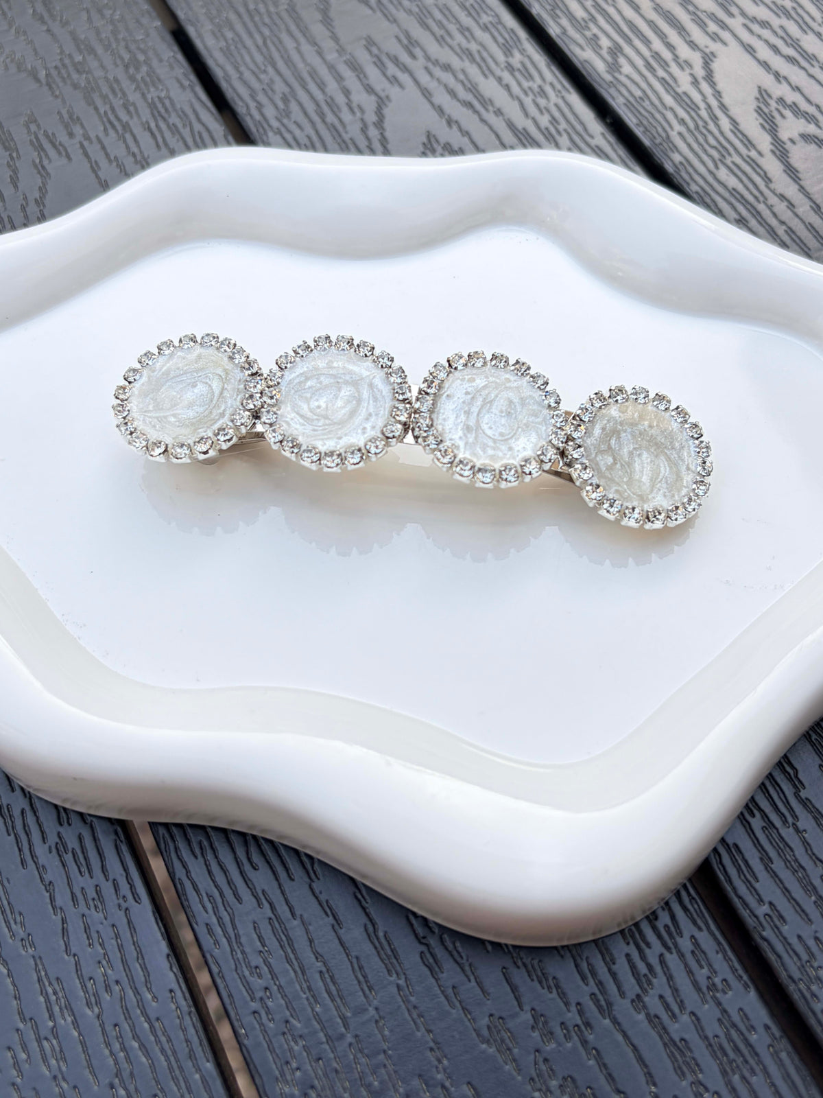 Broche blanco
